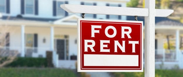 "for rent" sign in front of rental property